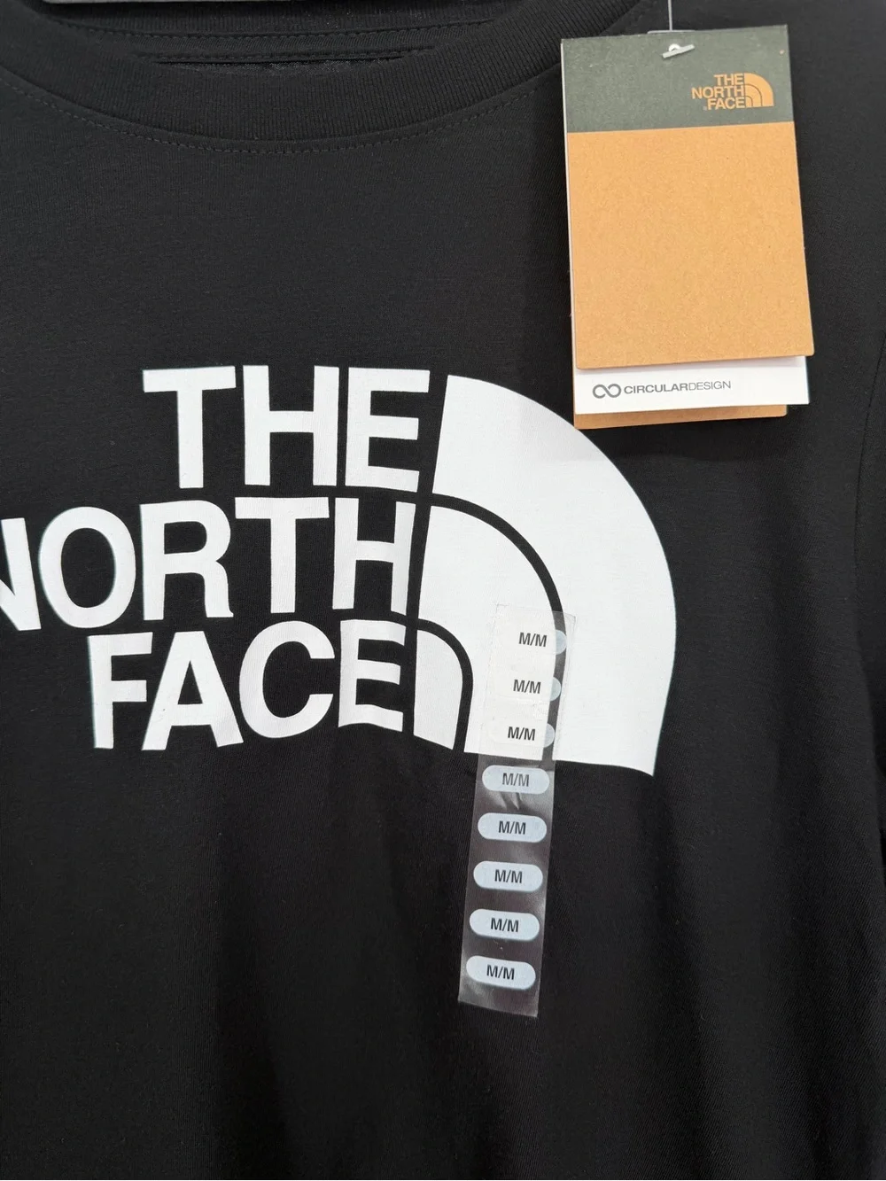 The North Face Black Tee with White Logo and Orange Tag - Picture 2 of 6